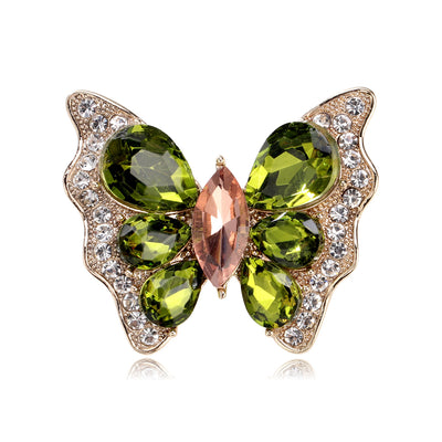 Front product view of butterfly ring with green and white crystals