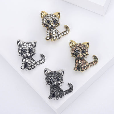 Crystal Kitten brooch shown in the available finishes