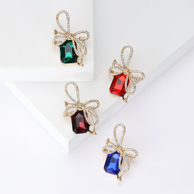 Main front view of Crystal Bow Brooch With Rectangular Gem In Four Colors
