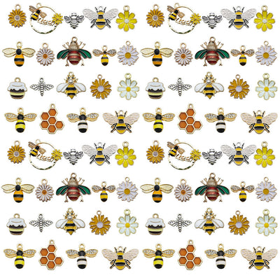 Colorful bee charms arranged on a light background