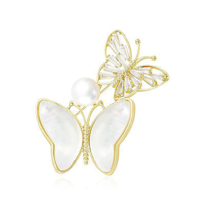 Double Butterfly brooch shown in the available finishes