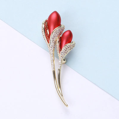 Red dual tulip brooch with gold stem front view
