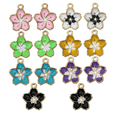 Colorful cherry blossom charms arranged on a light background