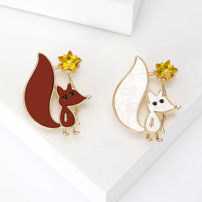 Front view of Playful Enamel Fox and Star brooch