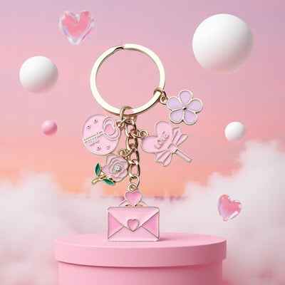 Main display of three pink heart rose envelope and candy keychains