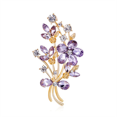 Front product view of the floral bouquet brooch pin in gold and purple