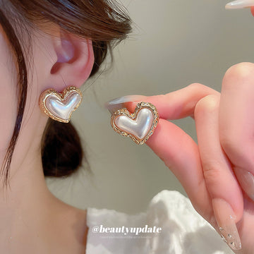 Sculpted Heart Stud Earrings In Pink And White With Polished Metal Tone Details