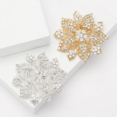 Front view of large layered flower with pointed crystal-set petals