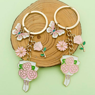Image 1 showing rose, sunflower and flower keychains shown in the product image.
