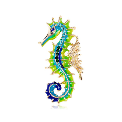 Front product view of the horse brooch pin in gold and green