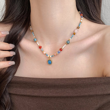 Multicolor Beaded Necklace with Blue Teardrop Pendant