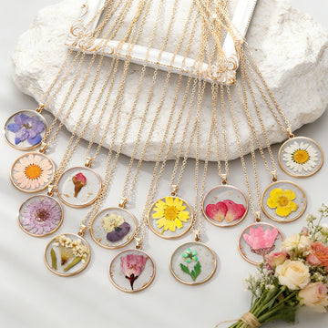 Gold Tone Round Pressed Flower Pendant Necklaces in Twelve Designs
