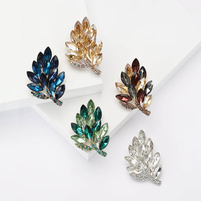 Front view of a curved leaf spray made from marquise-cut crystals