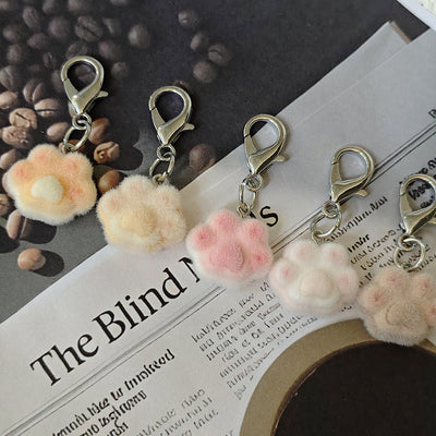 Main product view of flocked Cat Paw Lobster-Clasp Charms in Five Soft Colors