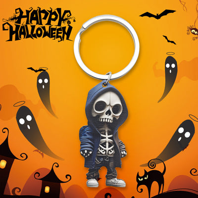 Dark blue hooded skeleton keychain on Happy Halloween graphic