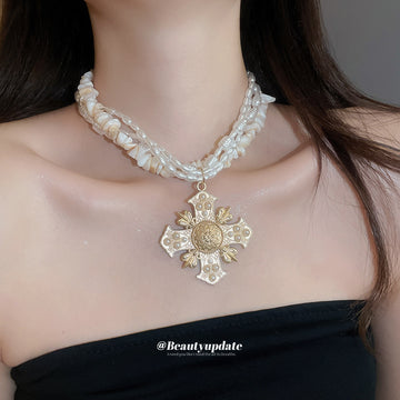 Multistrand Shell Bead and Ornate Cross Pendant Necklace