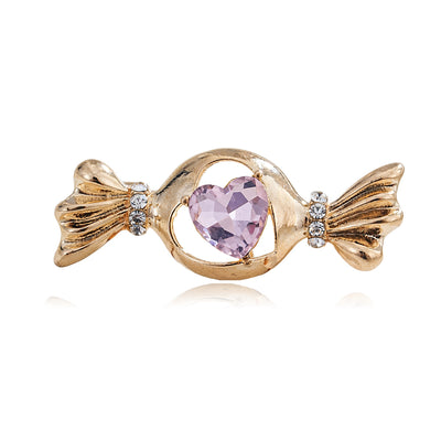 Front product view of the heart brooch pin in gold