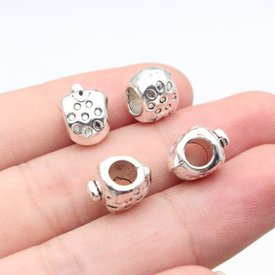 Textured Strawberry Large Hole Metal Bead hand-held front view