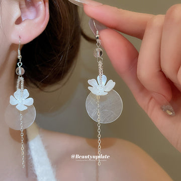 White Floral Disc and Chain Hook Earrings with Polished Metal Details