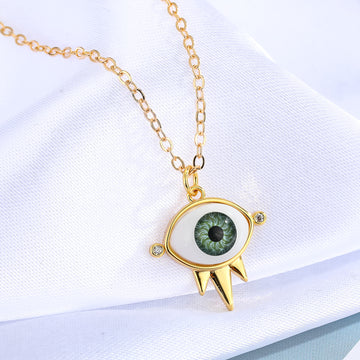 Gold Tone Green Eyeball Pendant Necklace with Spiked Lower Frame