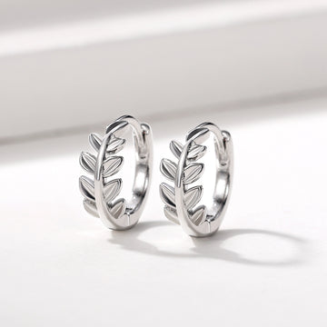 White Gold Leaf Branch Huggie Hoop Earrings Polished Metal