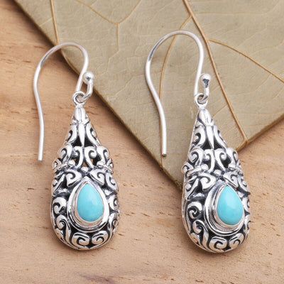 Front product view of the ornate teardrop frames with turquoise color centers