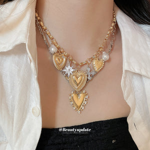 Layered Gold Tone Heart Necklace with Celestial Charms