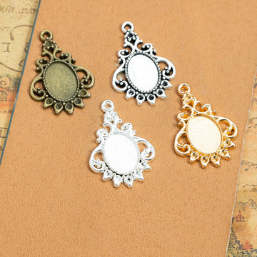 Bottle Shaped Oval Cabochon Pendant Trays in Four Finishes