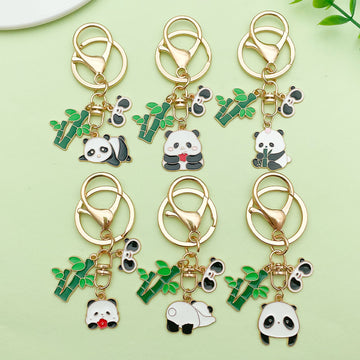 Panda Charm Keychains Featuring White Flower Across 45 Pictured Variations