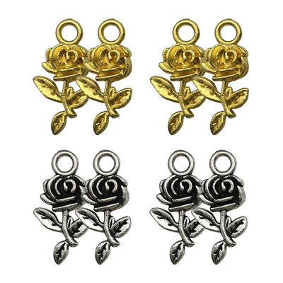 Gold-tone assorted shape charms arranged on a light background