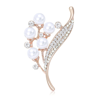 Pearl and Crystal Lily Stem Brooch shown against a white display background