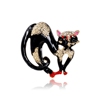 Front product view of the cat brooch pin in black and gold
