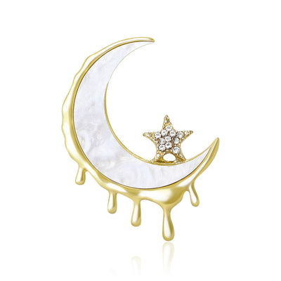 The first image shows the dripping crescent moon brooch from the front.