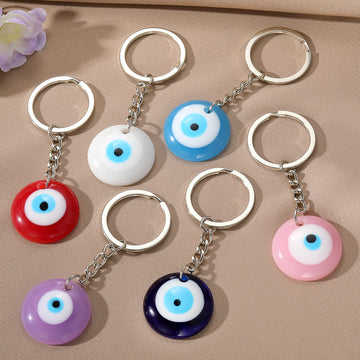 Silver Tone Round Evil Eye Keychains in Six Pictured Colors