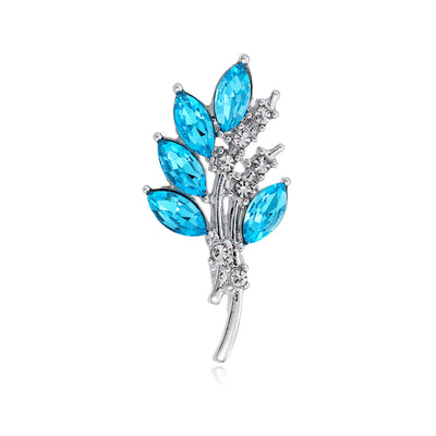 Front view of the blue branch metal brooch