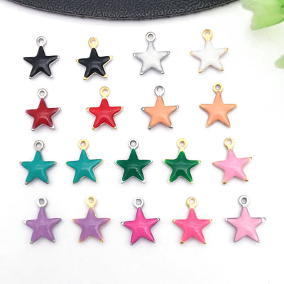 Colorful assorted shape charms arranged on a light background