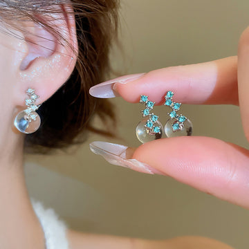 Blue Crystal Moon Pearl Drop Earrings with Distinctive Textured Details