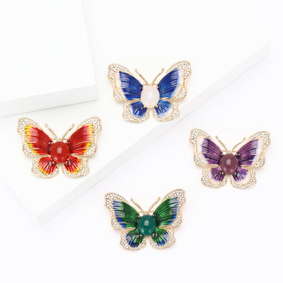 Enamel Butterfly Brooch With Crystal Edges shown from the front on a white background