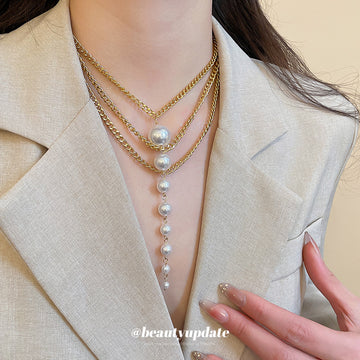 Gold Layered Pearl Drop Necklace with Graduated Chain Strands