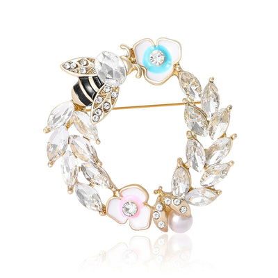 Front view of Crystal Bee and Flower Wreath brooch