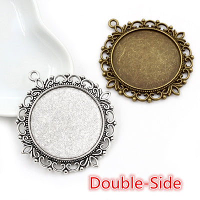 ornate double-sided round pendant tray assortment on a light background