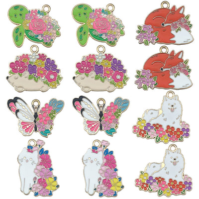 Colorful flower and turtle charms arranged on a light background