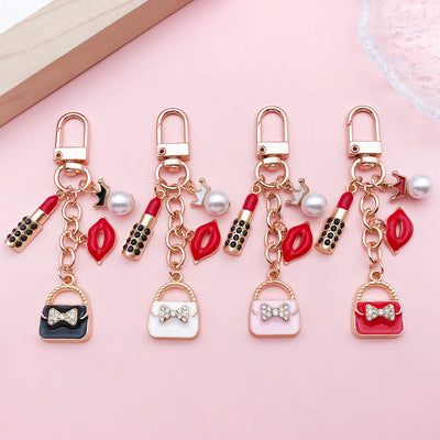 Image 1 showing a set of five different charms with various designs.