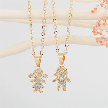 Gold Tone Crystal Boy and Girl Figure Pendant Necklaces