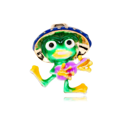 Front product view of the frog brooch pin in green and gold