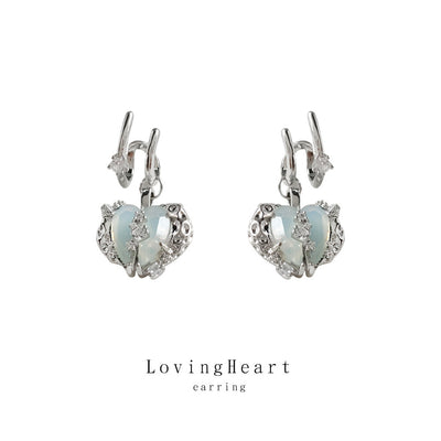 Silver split opaline heart drop earrings on white background