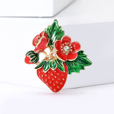 Red strawberry and flower cluster with green leaves brooch front view