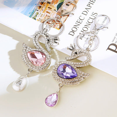 Main image 1 shows a supplied presentation of double sided crystal swan keychains with visible attached key hardware.