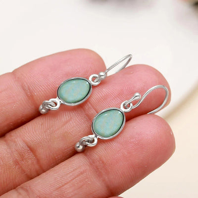 Silver Tone Oval Drop Earrings front product view