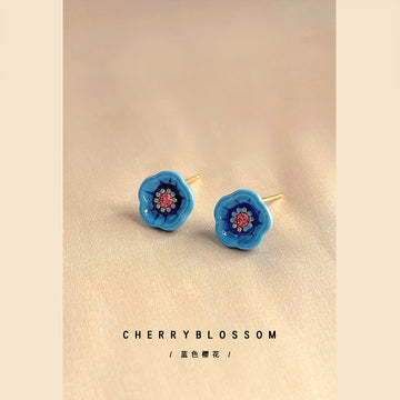 Gold Tone Blue Five Petal Flower And Red Center Stud Earrings